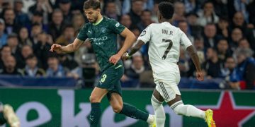 Ruben Dias (3) et Vinicius Junior lors de Real Madrid vs Manchester City